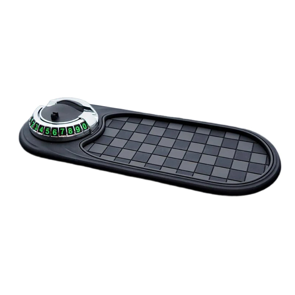 Black electronic device with a circular dial and grid layout on a white background
