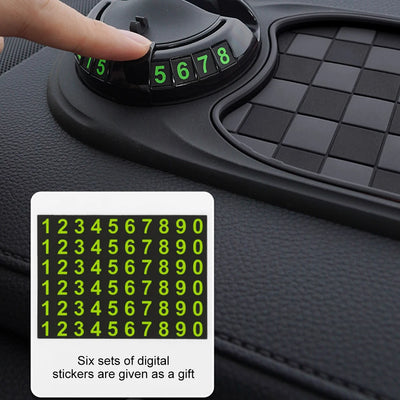 Digital sticker with green numbers on a car dashboard
