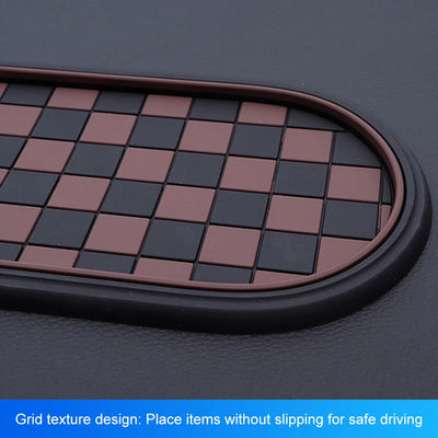 Grid texture design mat on a car dashboard with checkered pattern
