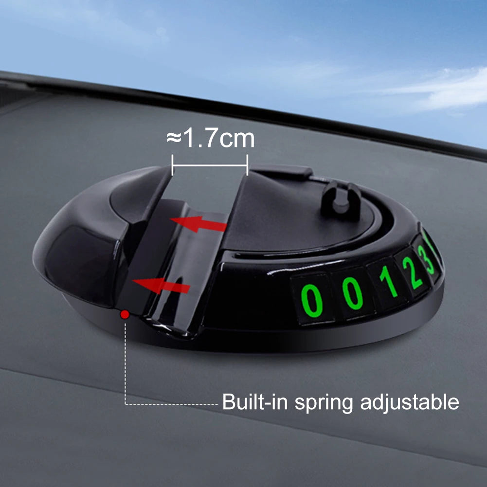 Black car visor with digital display and adjustable feature on a car dashboard.